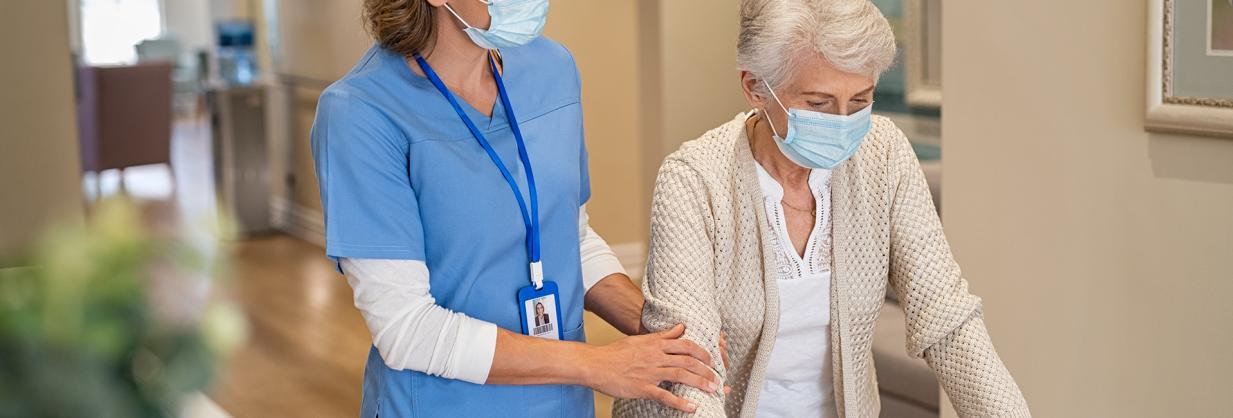 Healthcare worker assisting a woman