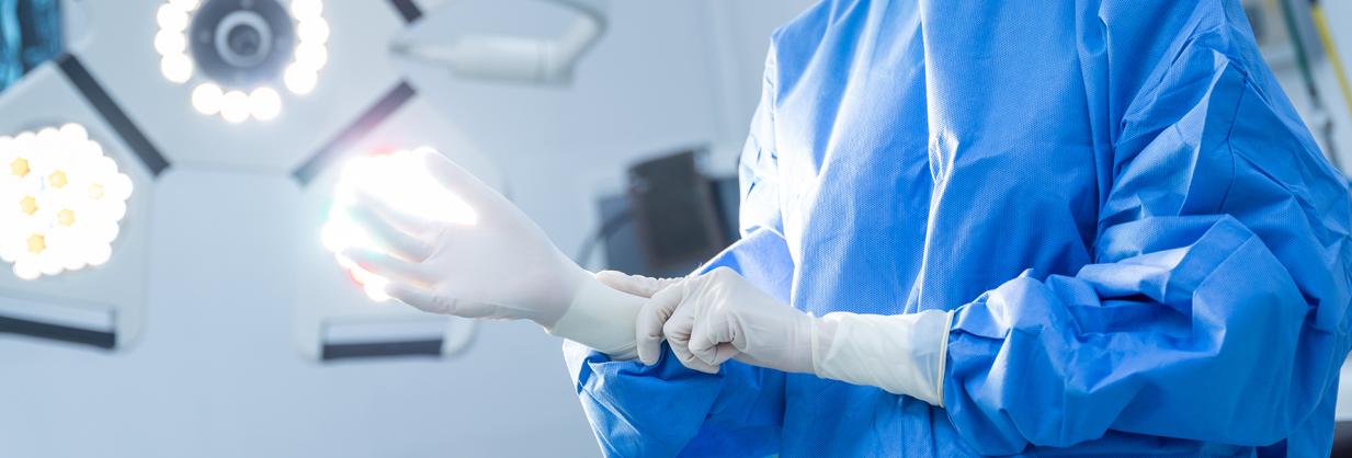 Healthcare worker prepping for surgery